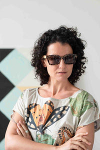 Eleanor in sunglasses, insect print shirt