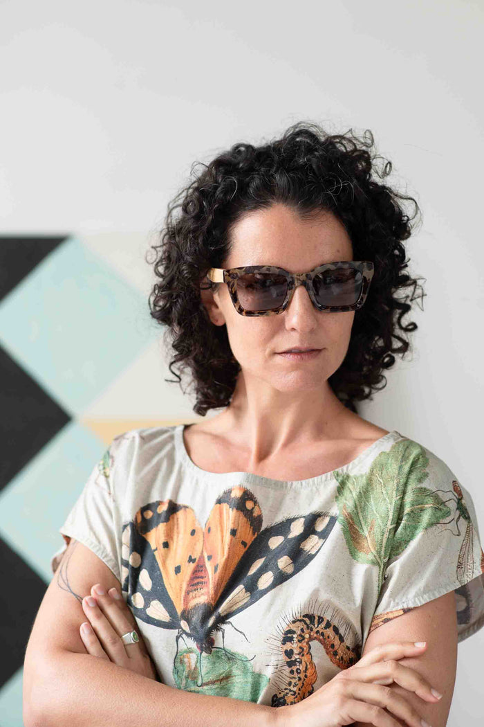 Eleanor in sunglasses, insect print shirt