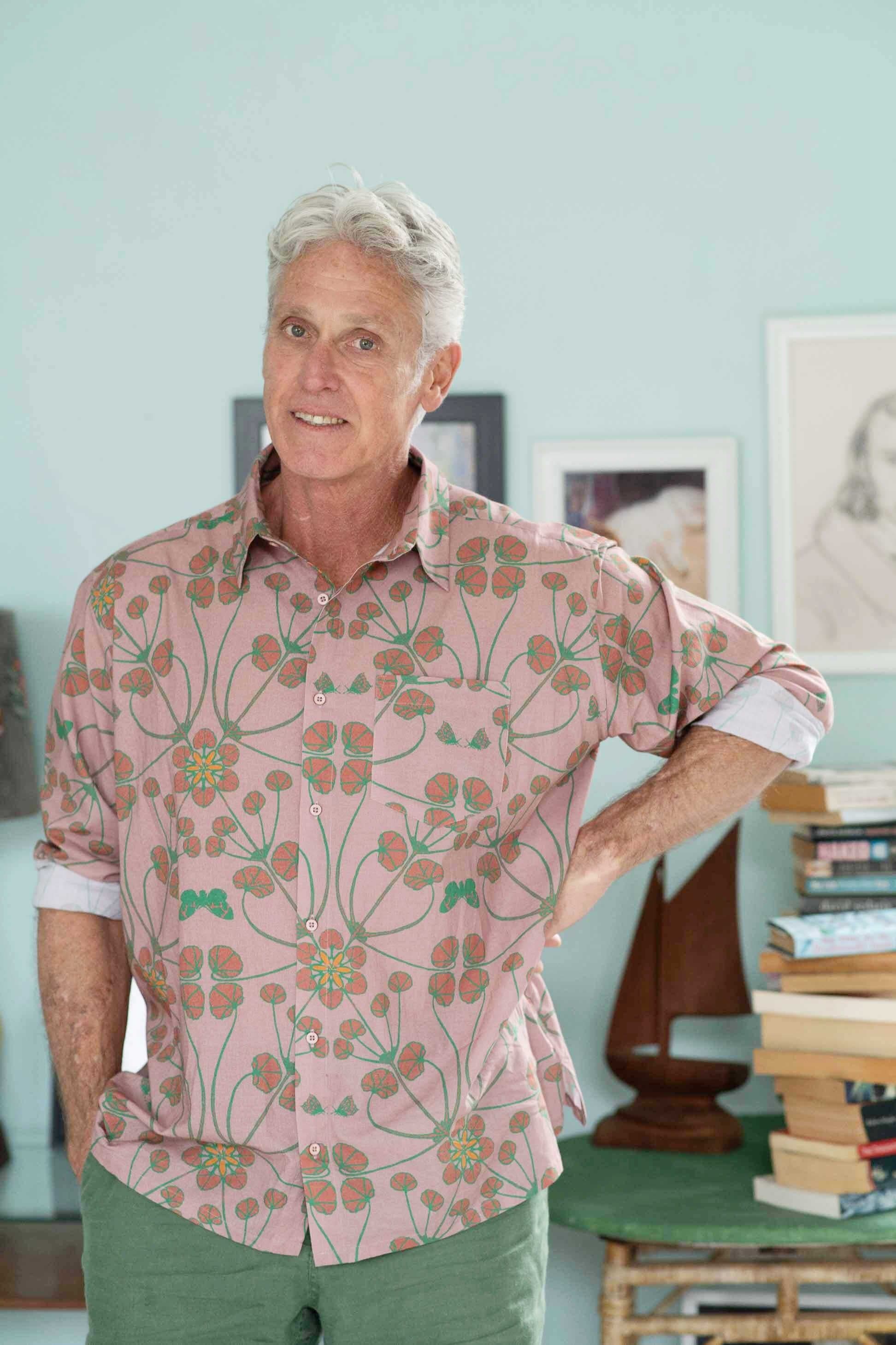 Ted Terra in patterned shirt smiling