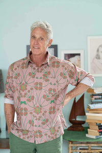 Ted Terra in patterned shirt smiling