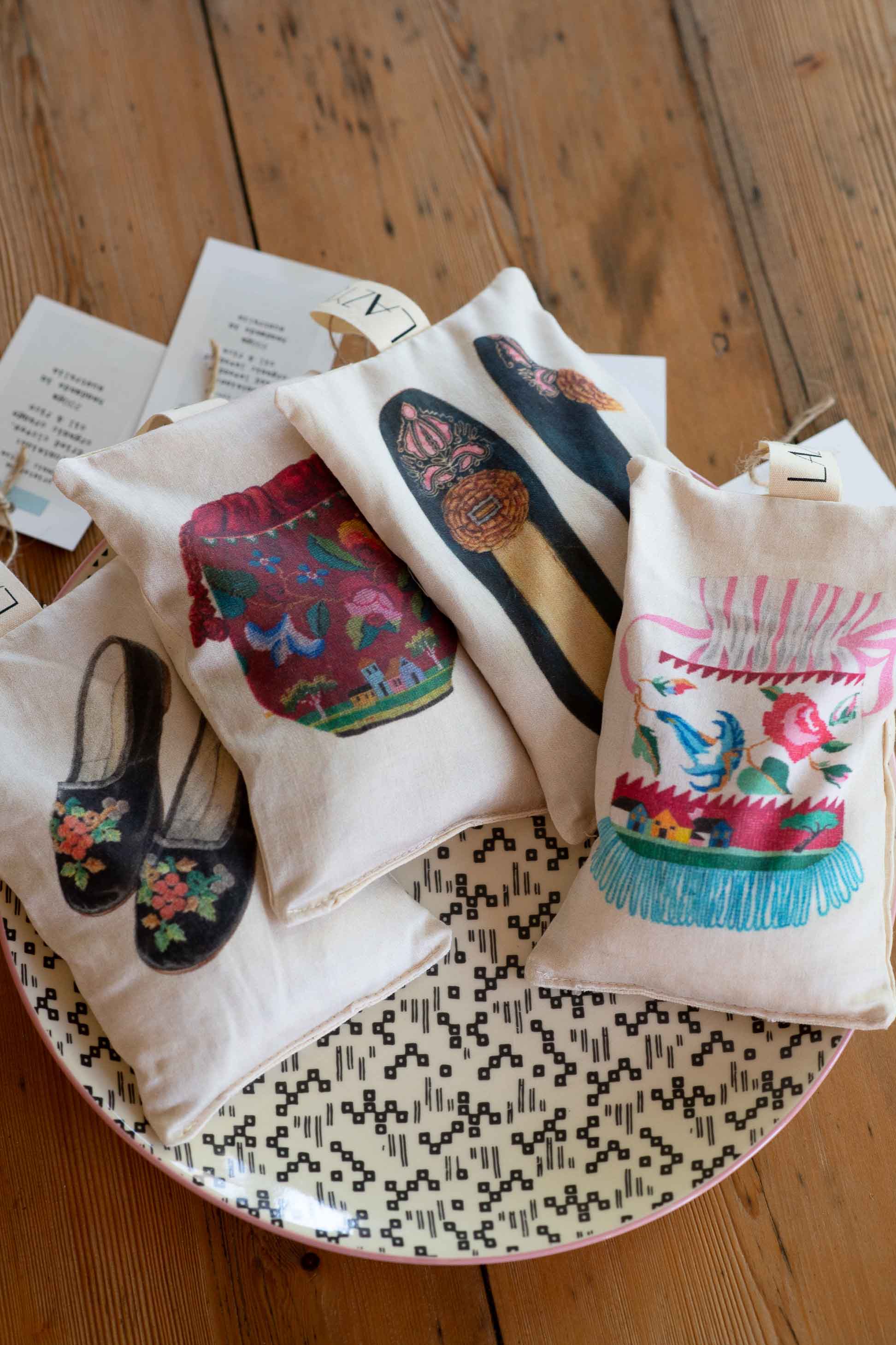 Closet scented sachets with shoe designs on a tray