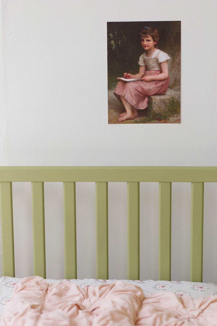 Vienna cot sheet with Tuscan pink quilt and art print for kids.