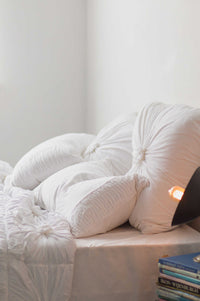White Euro pillowcase set with white rosette quilt