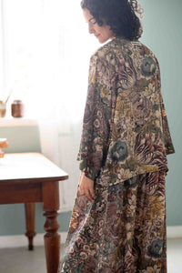 Woman wearing Love Grows Wild floral kimono slip