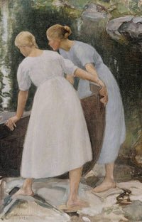 Two women by water, holding a boat.
