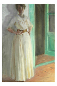 Woman in white dress standing near a green door.