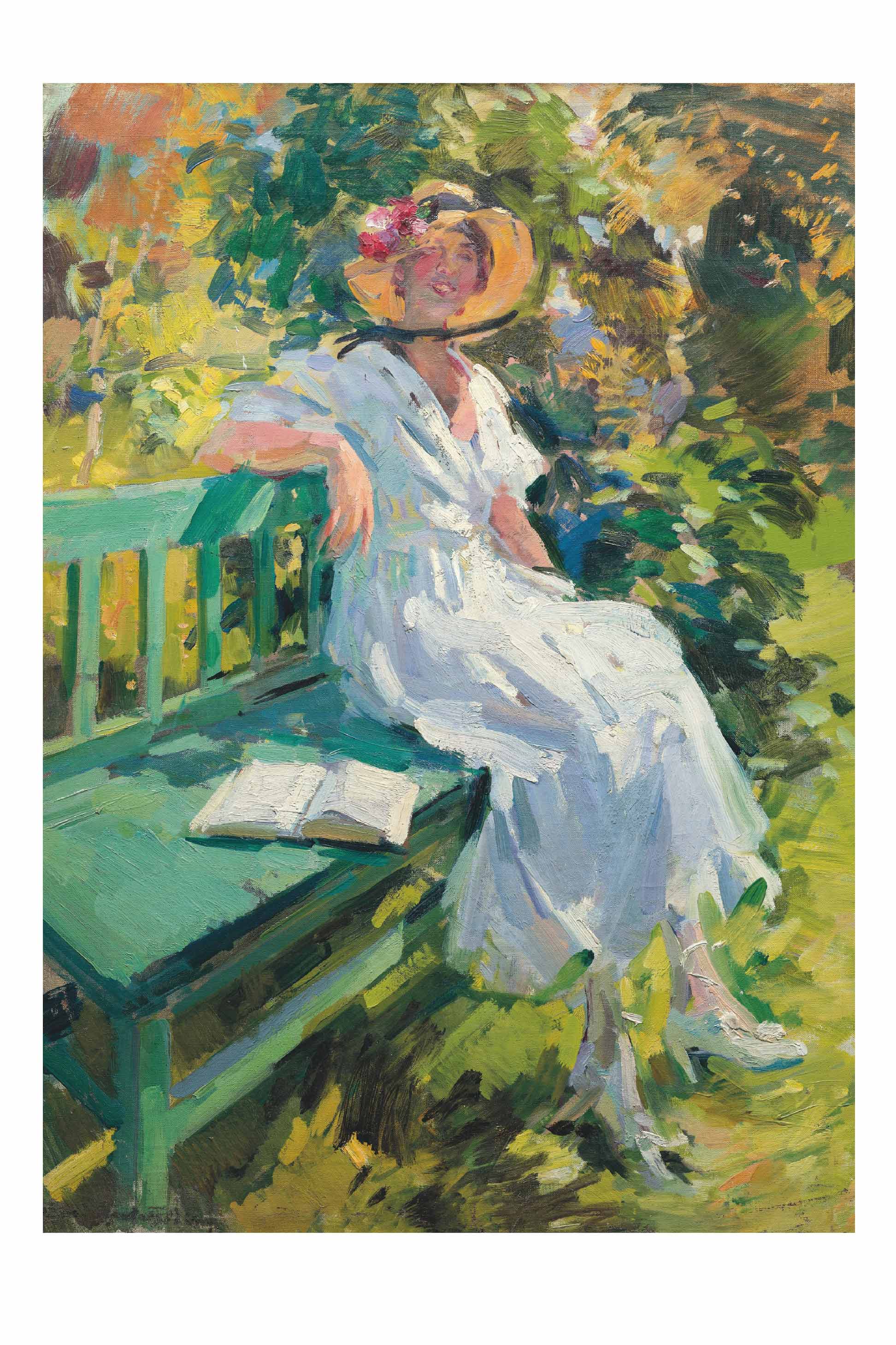 Woman in white dress relaxing in garden