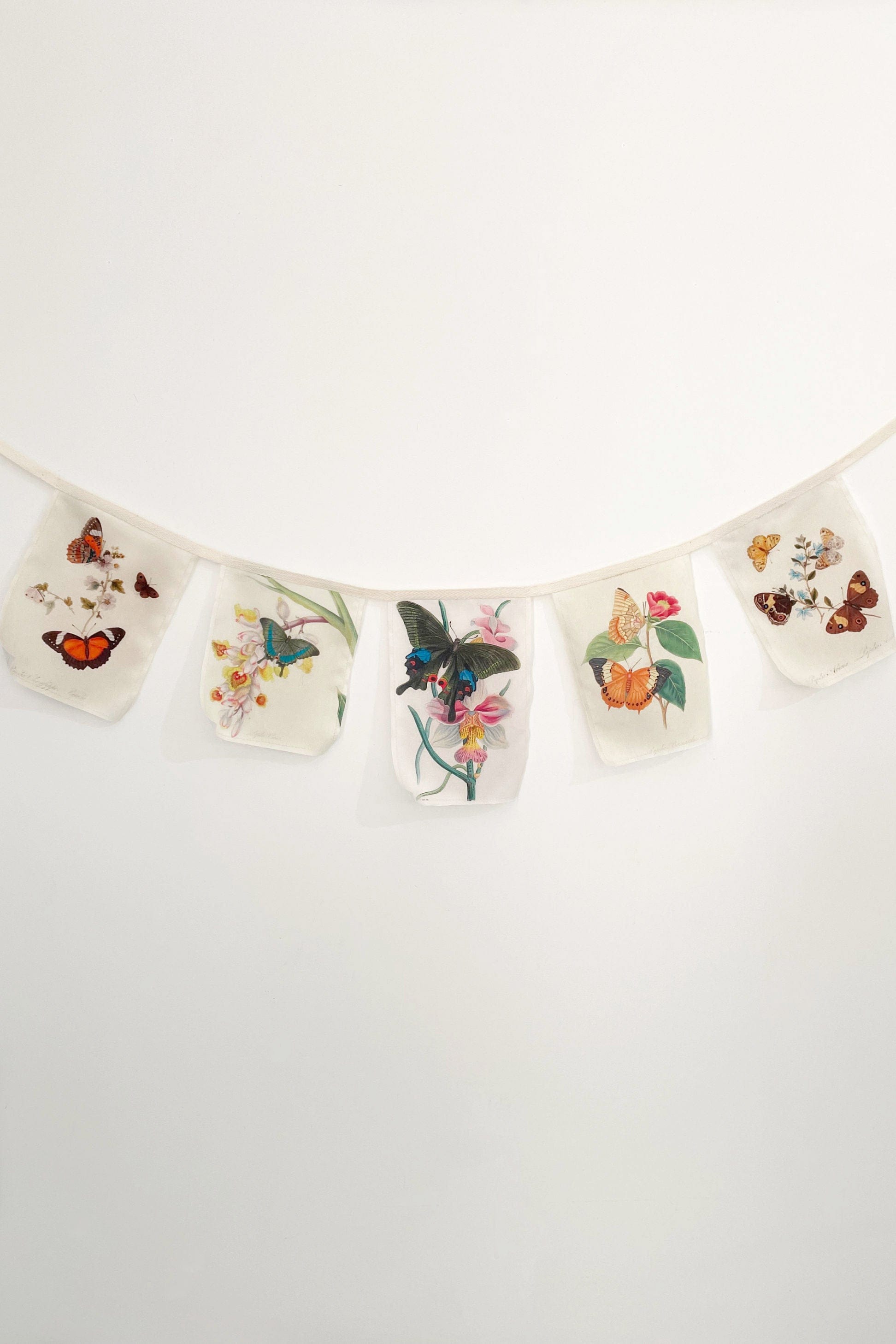 Butterfly garland with floral designs