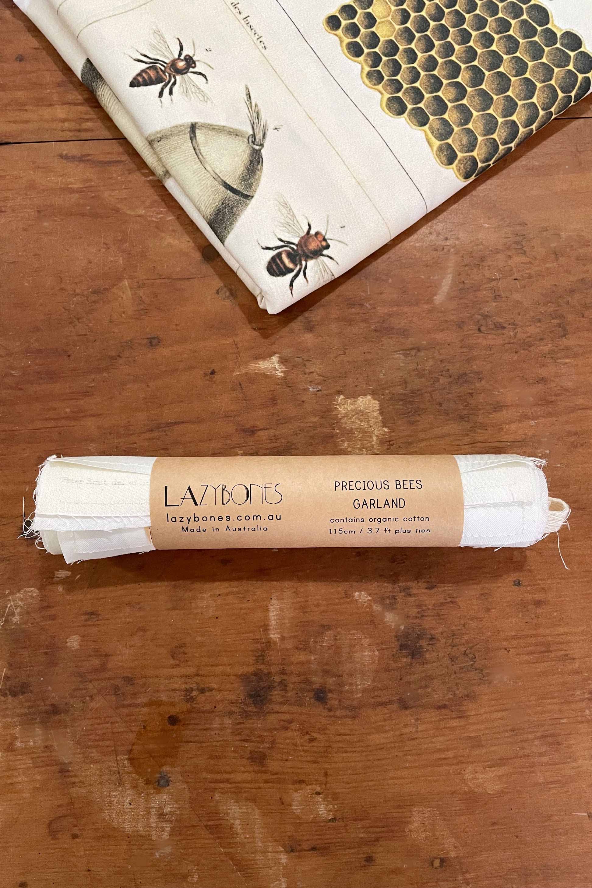 Precious Bees Garland packaging with bee illustrations.