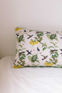 Hummingbird pillowcase set with floral and bird pattern.