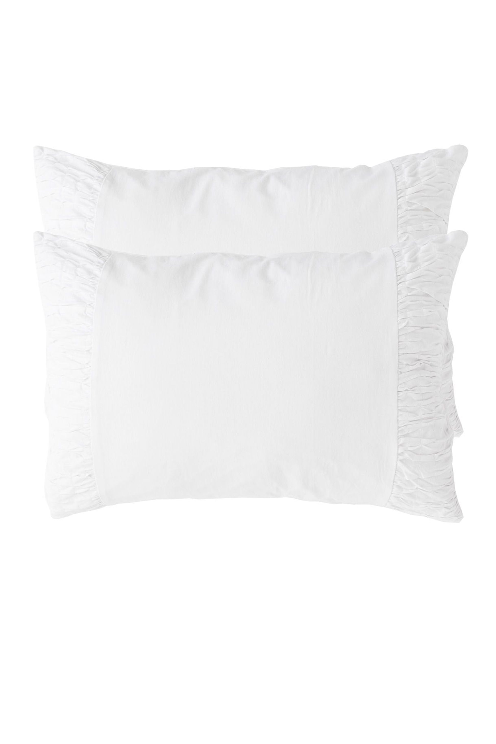 White pillowcase set with ruffled edges