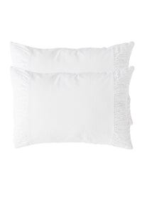 White pillowcase set with ruffled edges