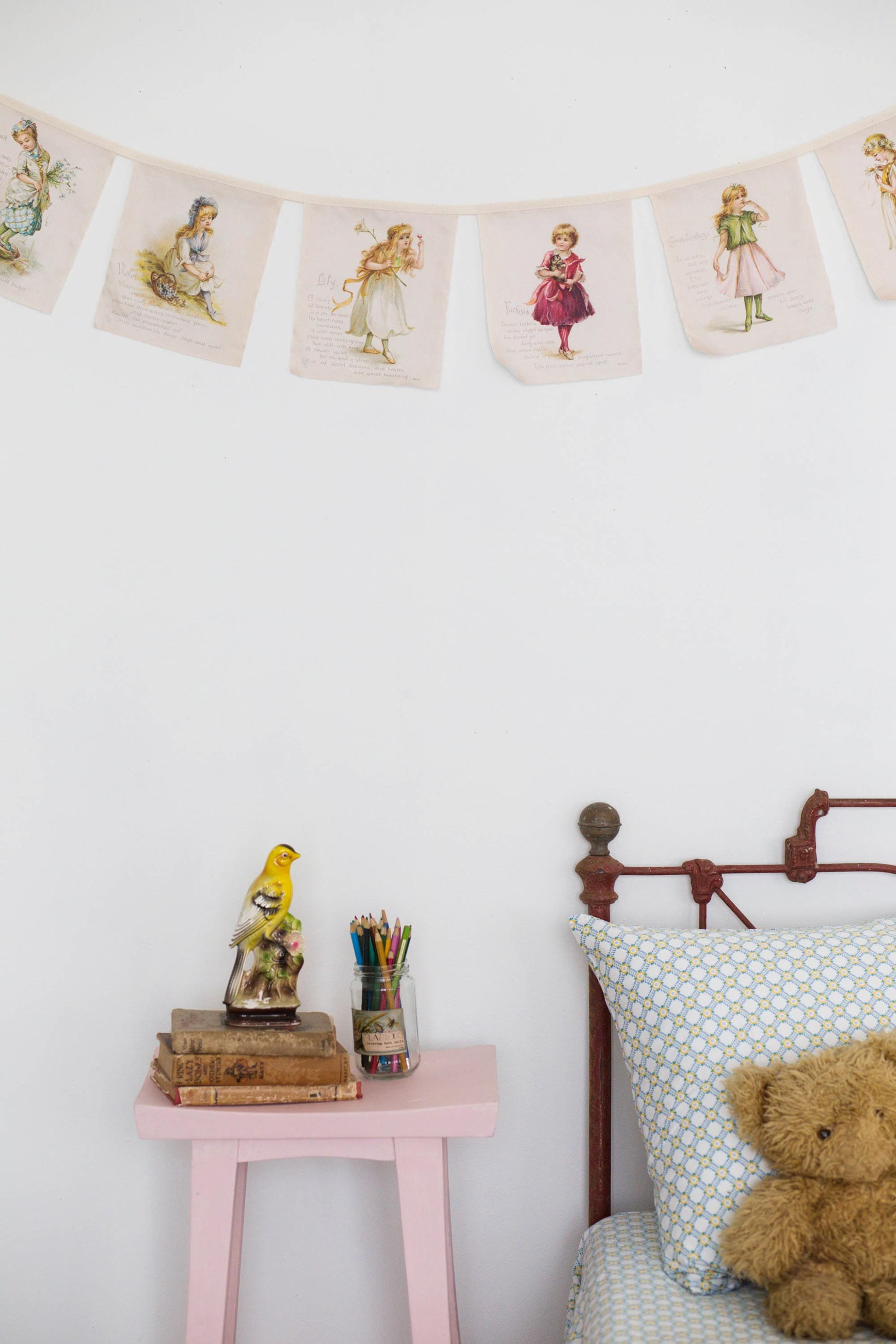 The Language of Flowers garland with vintage girl illustrations.